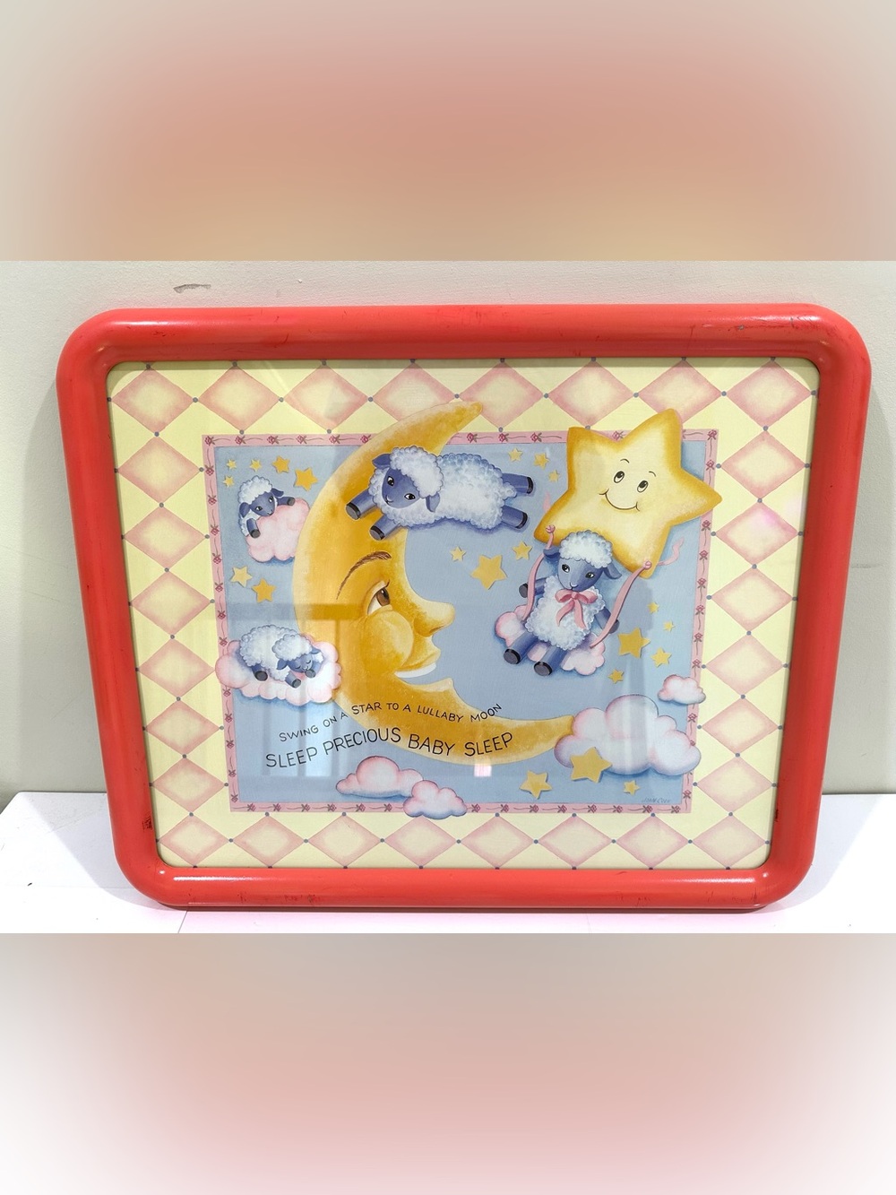 This is a rare vintage picture with a plastic frame. Measures 22"x18". Features
